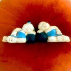 Vintage good luck wooden carving boy and girl asleep on watermelon or squash